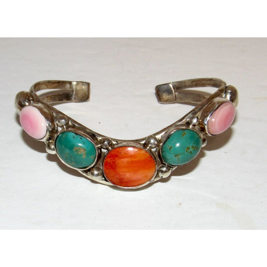 Navajo turquoise spiny oyster cuff bracelet Dave Lister with oval stones in silver setting