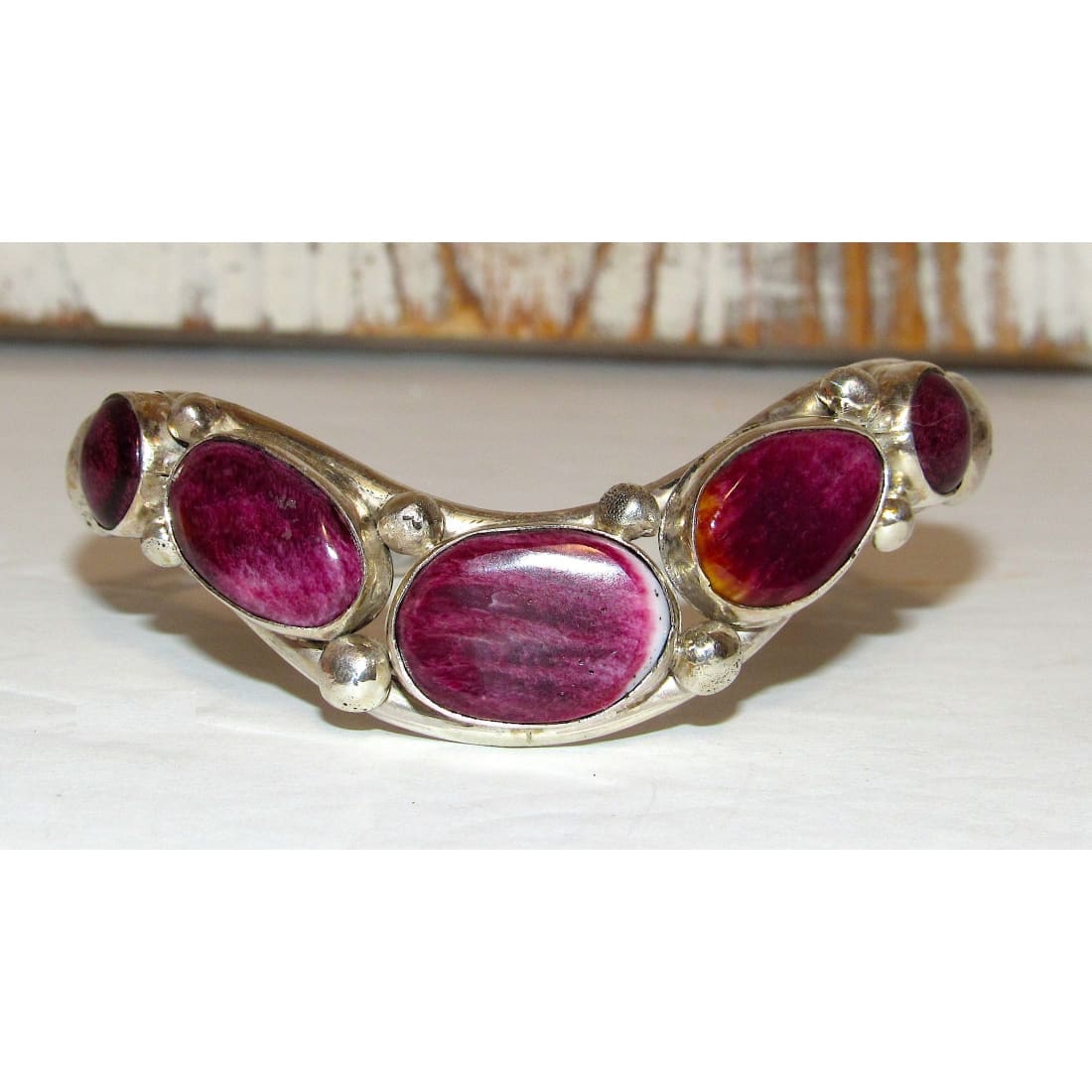 Native American Davida Lister Purple Spiny Bracelet with five polished purple stones set in silver