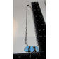 Navajo Golden Hills turquoise necklace with three blue turquoise stones on silver chain from The Southwestern Style Gallery