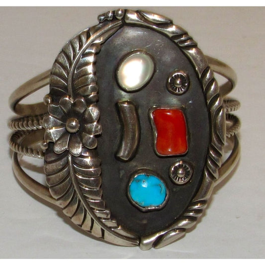 Native American Navajo turquoise coral sterling silver bracelet Joelias Draper with intricate floral and leaf design